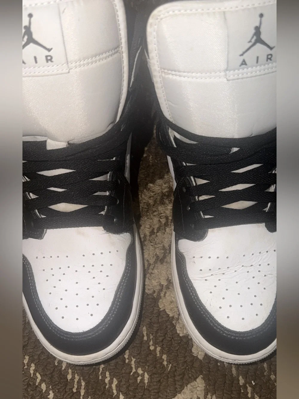 Jordan Black and White High-Top Sneakers